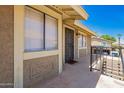 Private balcony view showcasing the unit's outdoor living space and secure entry, blending comfort with security at 1234 N 84Th Pl, Scottsdale, AZ 85257
