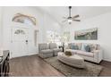 Bright living room featuring vaulted ceilings and stylish, comfortable furniture at 2137 E New Bedford Dr, Gilbert, AZ 85234