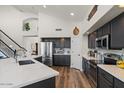 Well-equipped kitchen with stainless steel appliances, a large island, and ample counter space at 3123 E Buena Vista Dr, Chandler, AZ 85249
