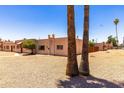 Inviting desert home featuring decorative architectural details and low-maintenance landscaping at 4625 W Thomas Rd # 50, Phoenix, AZ 85031
