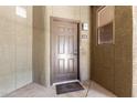 Close-up of condo entrance featuring a secure front door and unit number 326 at 5303 N 7Th St # 326, Phoenix, AZ 85014