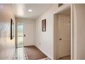 Bright entryway featuring neutral walls, tile flooring, and direct access to the front door at 8355 E Vía De Los Libros --, Scottsdale, AZ 85258