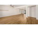 Bright living room with wood floors, white walls, and ample natural light at 1959 E Orion St, Tempe, AZ 85283