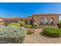 Beautiful single-story home with desert landscaping, covered entry, and ample curb appeal at 20211 E Via Del Oro --, Queen Creek, AZ 85142