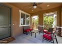 Cozy covered patio with outdoor seating, perfect for relaxing and entertaining at 2120 N Heritage St, Buckeye, AZ 85396