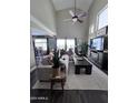 Comfortable living room featuring a vaulted ceiling and a cozy seating area at 2339 E Evans Dr, Phoenix, AZ 85022