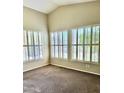 Bedroom has neutral carpet, shutters on windows and a vaulted ceiling at 4327 E Desert Sky Ct, Cave Creek, AZ 85331