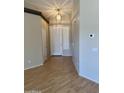 Bright entryway features wood floors, high ceilings and a white front door with matching trim at 4327 E Desert Sky Ct, Cave Creek, AZ 85331
