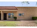 Close up of a tan, single-story home with desert landscaping at 17228 N 16Th Dr # 3, Phoenix, AZ 85023