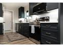 Bright kitchen features modern appliances, ample storage, white countertops and decorative backsplash at 236 E Minton Dr, Tempe, AZ 85282