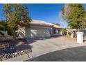 Charming single-story home featuring a well-maintained front yard and attached two-car garage at 3956 N 151St Dr, Goodyear, AZ 85395
