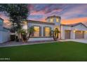 Charming home featuring manicured lawn, desert landscaping and a unique turret architectural detail at 4206 E Blue Ridge Pl, Chandler, AZ 85249