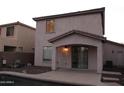 Covered patio in backyard with access to pool area, perfect for outdoor living and entertaining at 4145 E Santa Fe Ln, Gilbert, AZ 85297