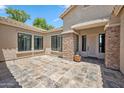 Inviting front entrance with stone accents, tile flooring and covered entry way at 422 E Kaibab Pl, Chandler, AZ 85249