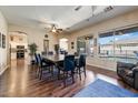 Spacious dining room with hardwood floors and views of the pool at 776 W Carob Way, Chandler, AZ 85248