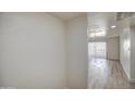 Living room with hard surface floors and a large window letting in natural light at 7920 E Camelback Rd # 609, Scottsdale, AZ 85251