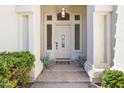 Elegant entryway featuring a detailed front door with sidelights and decorative glass at 3146 E Maryland Ave, Phoenix, AZ 85016