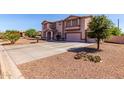 Charming two-story home with a spacious driveway, beautiful desert landscaping, and a two car garage at 31700 N Sunflower Way, San Tan Valley, AZ 85143