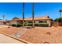 Charming single-story home with a well-maintained front yard featuring desert landscaping at 3913 N 86Th St, Scottsdale, AZ 85251
