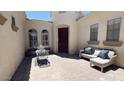 Private courtyard featuring comfortable seating, perfect for outdoor relaxation and enjoying the sunshine at 4277 E Blue Sage Ct, Gilbert, AZ 85297