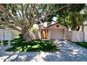 Charming home exterior with mature trees and well-maintained landscaping at 16644 N 33Rd St # 101, Phoenix, AZ 85032