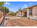 Fun backyard with a basketball court and shuffleboard, perfect for outdoor activities and Gathering fun at 1755 E Tonto Dr, Chandler, AZ 85249