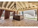 Inviting covered patio with a hot tub, offering a relaxing outdoor experience at 1755 E Tonto Dr, Chandler, AZ 85249