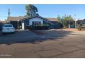 Charming single-story home featuring a tile roof and a well-maintained front yard at 3830 W Cavalier Dr, Phoenix, AZ 85019