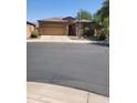 Charming single-story home with a tile roof, two-car garage, and well-maintained front yard at 4778 E Sourwood Dr, Gilbert, AZ 85298