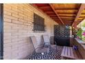 Relaxing covered patio featuring comfortable seating, perfect for enjoying outdoor living in style at 6739 N 16Th St # 14, Phoenix, AZ 85016