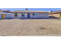 Single-story home with low-maintenance gravel front yard and well-kept exterior at 7332 W Desert Cove Ave, Peoria, AZ 85345