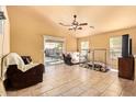 Spacious living room with access to outdoor patio, offering bright and airy living space at 1619 E Aspen Ave, Buckeye, AZ 85326