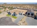 Spacious single-Gathering home with a large lot, a separate garage, and a well-manicured lawn at 2095 N 77Th Pl, Mesa, AZ 85207