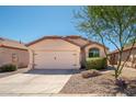 Charming single-story home featuring a two-car garage and low maintenance landscaping at 21632 N 48Th St, Phoenix, AZ 85054