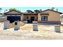 Newly constructed single Gathering home with modern design elements and landscaping features in a vibrant neighborhood at 3028 N 47Th St, Phoenix, AZ 85018