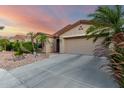 Inviting exterior showcasing a well-maintained front yard with mature palm trees at 4637 E Narrowleaf Dr, Gilbert, AZ 85298