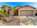 Inviting single-Gathering home with desert landscaping and attached two car garage at 4637 E Narrowleaf Dr, Gilbert, AZ 85298