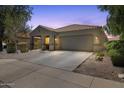 Attractive single-story home with a tile roof, neutral paint, and low maintenance landscaping at 5026 S 235Th Dr, Buckeye, AZ 85326