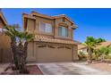 Charming two-story home with desert landscaping, and a two car garage at 7724 W Oraibi Dr, Glendale, AZ 85308