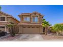 Charming two-story home with desert landscaping, and a two car garage at 7724 W Oraibi Dr, Glendale, AZ 85308