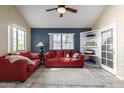Comfortable living room features vaulted ceilings, a ceiling fan, and tile flooring for easy maintenance at 1222 W Baseline Rd # 119, Tempe, AZ 85283