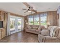 Comfortable living room with a ceiling fan and natural lighting at 17200 W Bell Rd # 2189, Surprise, AZ 85374
