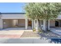 Inviting home exterior with private carport and well maintained desert landscaping at 3415 N 36Th St # 3, Phoenix, AZ 85018