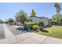 Exterior view showcasing mature trees, green lawns, landscaping, and building architecture at 3415 N 36Th St # 3, Phoenix, AZ 85018