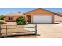 Charming single-story home featuring a two-car garage and easy to maintain desert landscaping at 3507 W Oakland St, Chandler, AZ 85226