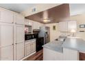 Spacious kitchen boasts abundant storage and modern appliances at 1133 N 84Th Pl, Scottsdale, AZ 85257