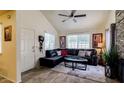 Comfortable living room with vaulted ceilings, modern ceiling fan and inviting decor at 1222 W Baseline Rd # 163, Tempe, AZ 85283