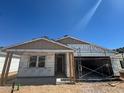 Exterior view of a single-Gathering home under construction with a two-car garage and covered entry at 16178 W Bajada Rd, Surprise, AZ 85387