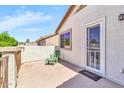 Outdoor patio with a lounging area overlooking the houses and scenery at 21050 E Munoz St, Queen Creek, AZ 85142