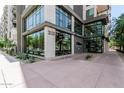 Modern building exterior with floor to ceiling windows and unique architectural design at 3131 N Central Ave # 7004, Phoenix, AZ 85012